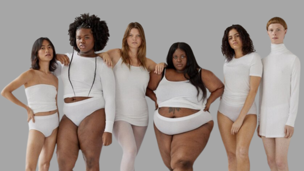 A diverse group of women of various sizes and colors celebrating inclusivity in 2025 fashion trends.